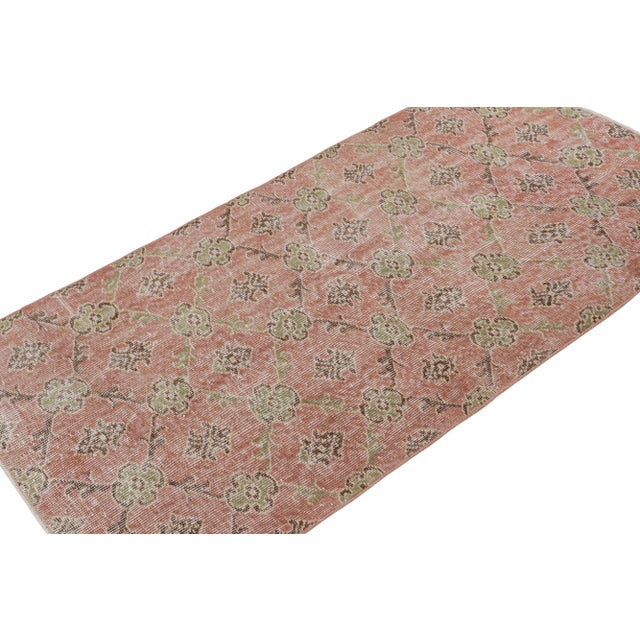 Handknotted in wool, this 3x6 vintage Art deco Zeki Múren rug originates from Turkey, circa 1960-1970 and is latest to...