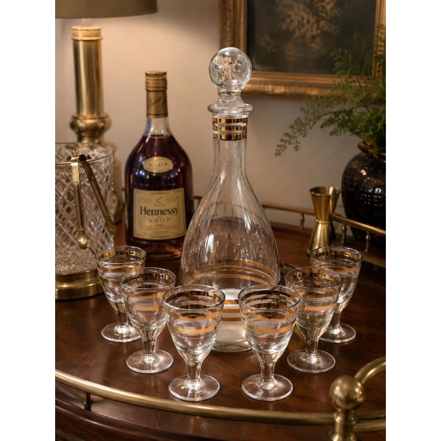Elegant vintage handmade crystal decanter set produced in the former Soviet Union during the 1960s or 1970s. This striking...