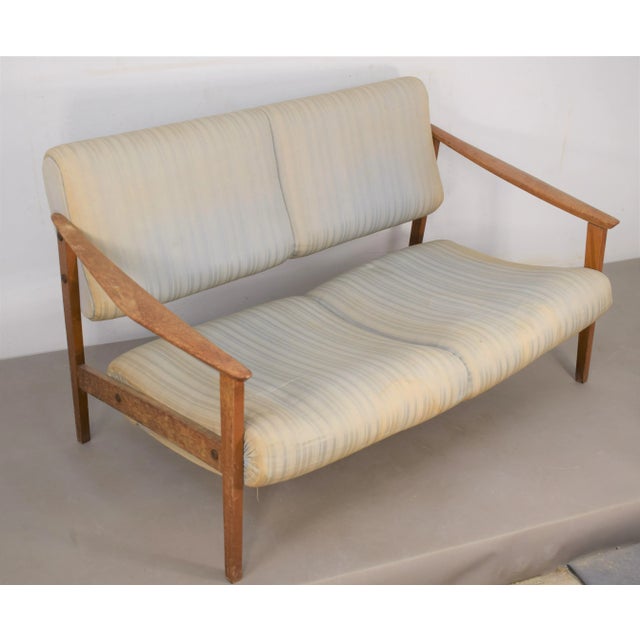 Italian-made sofa from the 1970s. wood and fabric. fair condition with obvious signs of time wear(see photos)....