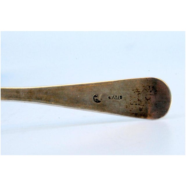 Plain Silver Sugar Spoon with Handle, in Very Good conditions. Designed before 1890 This piece has an attribution mark, I...