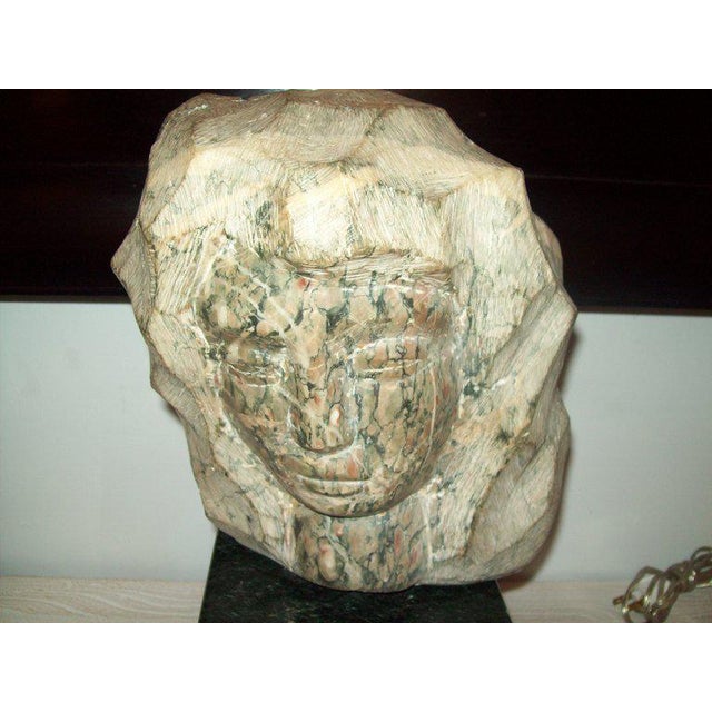 Modernist marble sculpture on granite base, signed Simon.