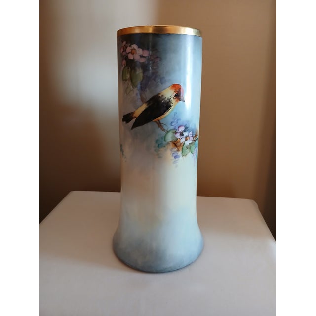 Antique Limoges from B & C France(Bernardaud & Company). A lovely detailed vase of Taningers and flowers. Gilt trim has a...