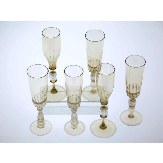 from Cenedese's personal collection. Here is a set of 6 stemmed glasses in 3 different designs. All in light smoke. This...
