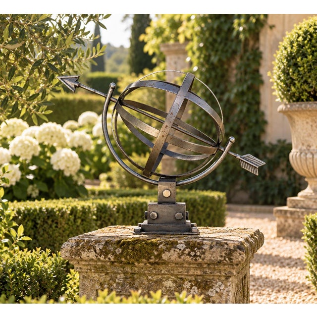 A stunning contemporary iron garden armillary sundial beautifully crafted in the brutalist style. Pieces like this are...