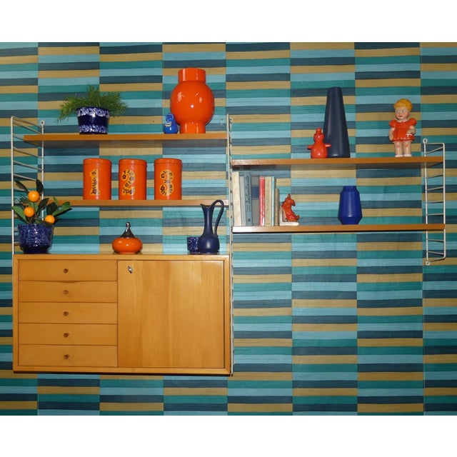 An absolute classic! simple swedish design design classic nisse strinning designed his famous shelving system in 1949. It...