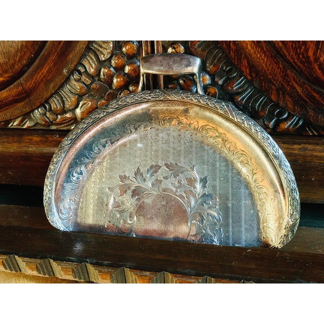An absolutely beautiful antique silver-plate table crumb, butler’s tray. The basin is hand engraved with a moire style...