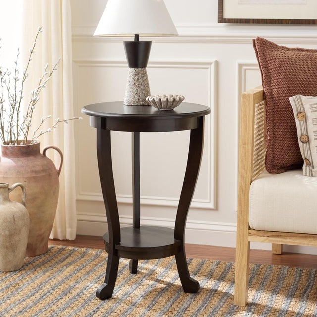 The Mary Pedestal Side Table, crafted of pine with a dark chocolate finish, is the perfect accent for any room in need of...