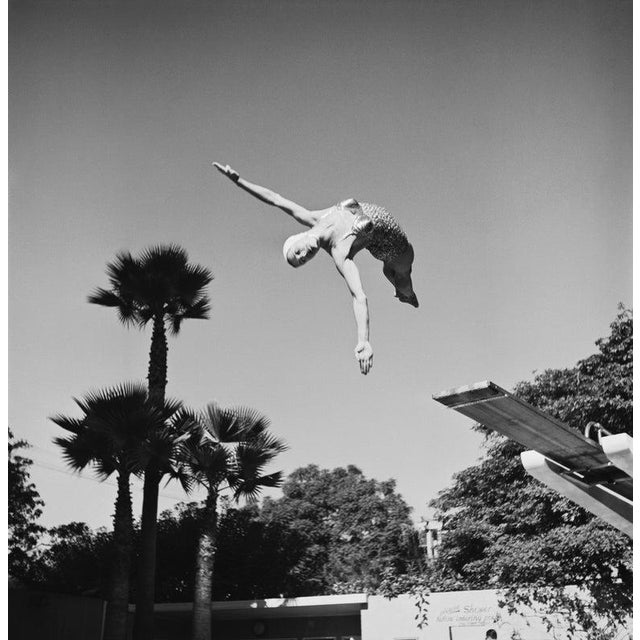 Helen Crlenkovich American diver Helen Crlenkovich (1921 - 1955) jumping from a springboard, Los Angeles, California,...