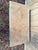 A louis xiii style coffee table in solid cherry wood, featuring a parquet top composed of pieces of wood arranged in...