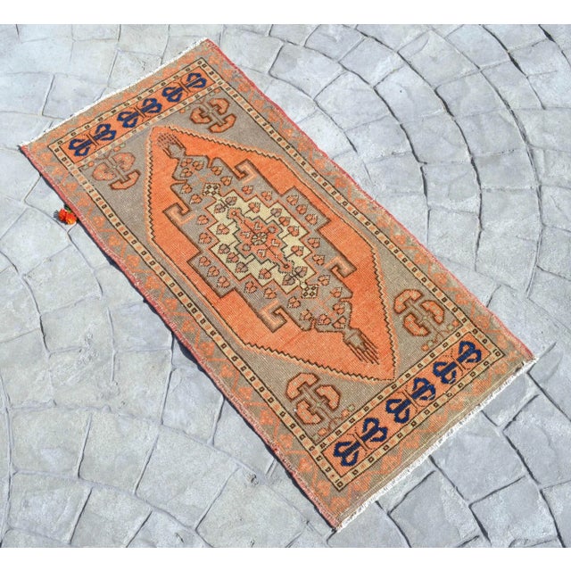 Vintage raw sienna (brilliant red-orange) color background rug perfect for a small area Dimensions: 21" x 41" or 1 ft 9 in...