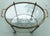 Mid Century Brass Oval Serving Cart with Removable Gallery Tray top and central 4 Bottle Rack. Glass is clear.