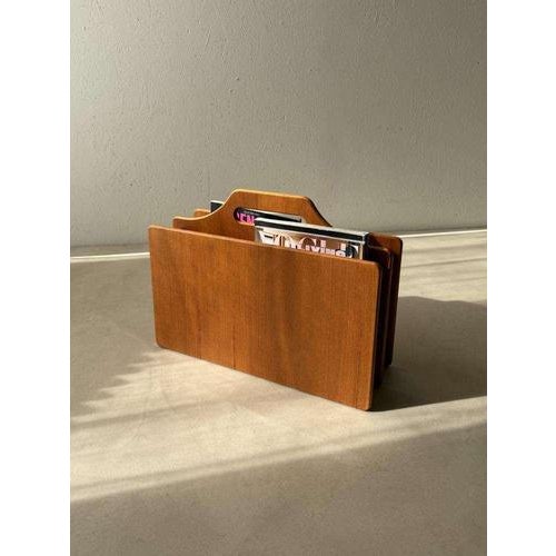 Good design needs no explanation. This Danish magazine rack from the 1970s demonstrates the power of simplicity. Clean...