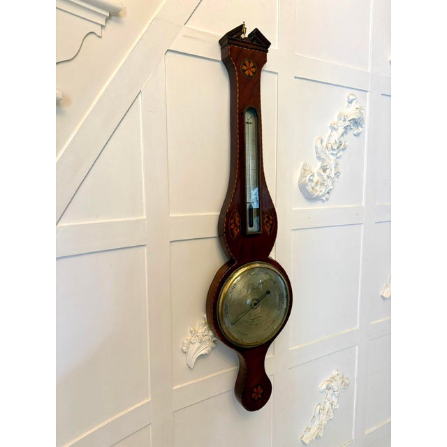 Antique George III quality mahogany shell inlaid banjo barometer having a quality mahogany banjo shaped case with...
