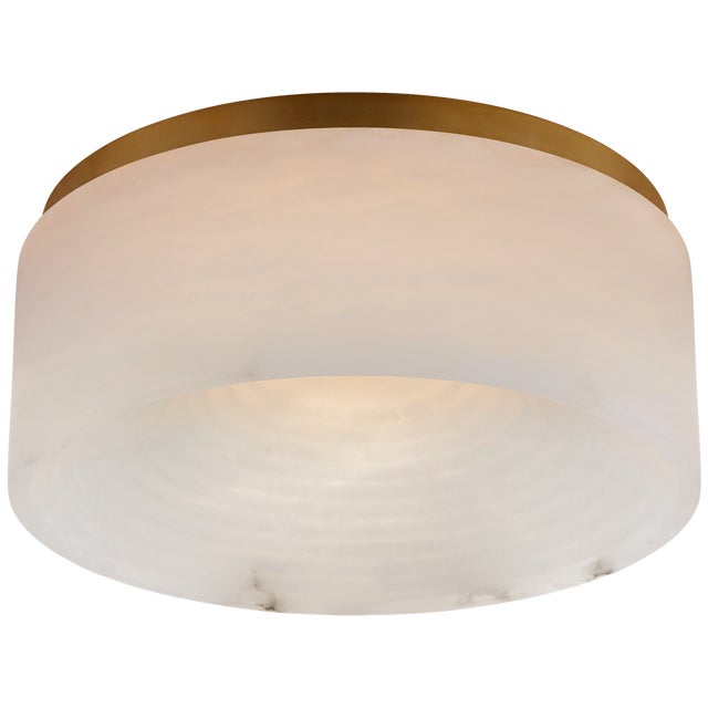 Otto Medium Flush Mount in Antique-Burnished Brass with Alabaster Designer: Kelly Wearstler Canopy: 11.25" Round Mounting:...