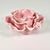 This Knife Cut Ceramic low rise table top candleholder is a Pink Lotus flower with layers of petals. The design features a...