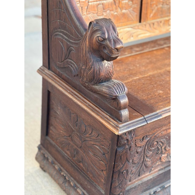 This Victorian oak monk’s bench (or settle) is a powerful and richly detailed example of late 19th-century craftsmanship,...