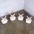 White Mid-20th Century MCM Burke Tulip Side Chairs No 103 White Shell Black Cushions Oval Stationary 4 Prong Base Set of 4 For Sale - Image 8 of 18
