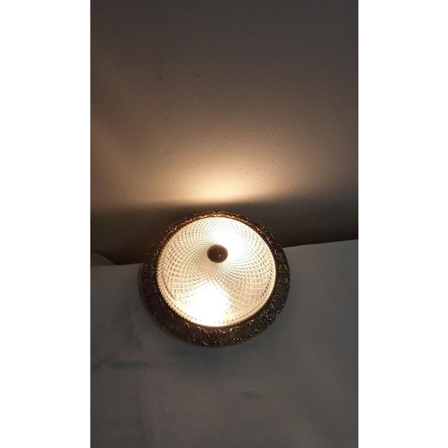 Vintage Flat Ceiling Lamp with Relief Glass Bowl on Gold-Colored Metal Mount, 1980s, in Very Good conditions. Designed...