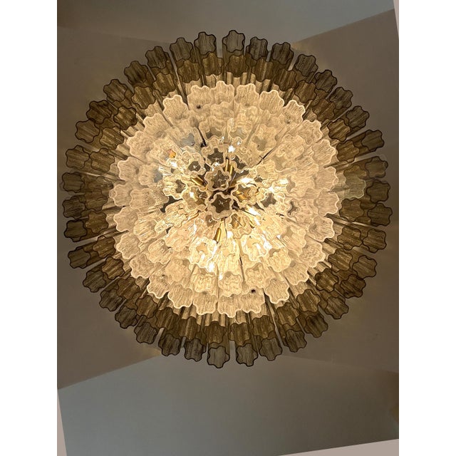 Scenographic and luxury flush mount , all made in Italy, made in Murano glass. Transparent and fumè color give warm and...