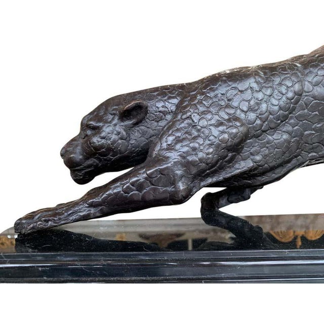 Gorgeous french bronze casting of an art deco style puma or panther. Classically sleek and aerodynamic with lovely patina...
