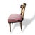 A charming pair of vintage neoclassical-style side chairs featuring elegantly tapered legs, curved back supports, and...
