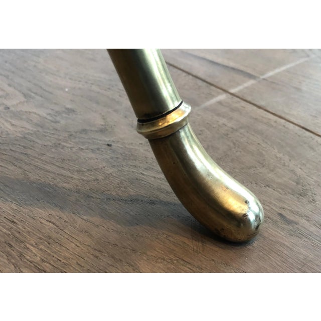 This rare pair of neoclassical style magazine racks is made of brass. This is a work attributed to famous French designer...