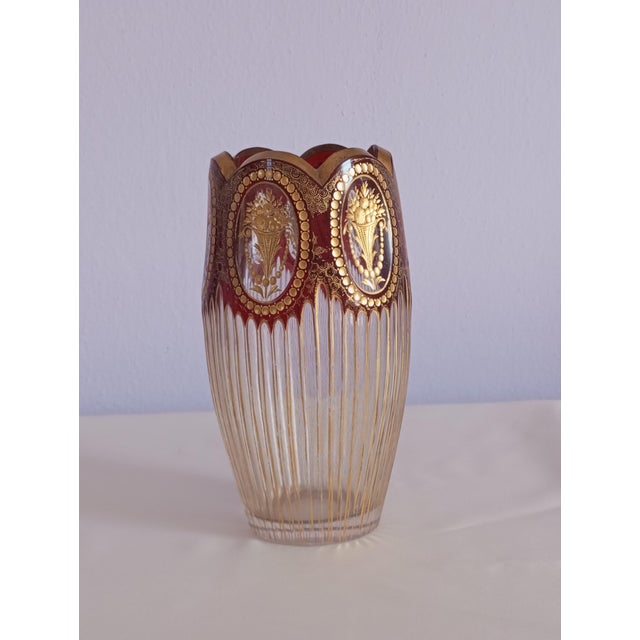 This beautiful decorative cut glass vase is crafted with intricate details and engravings in Bohemia in the early 20th...