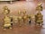 This finely cast pair of antique fireplace chenets brings impressive architectural detail and refined Louis XVI elegance...