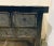 Stylish Organic Modern Carved Black Wood Rustic Console Table, 11 drawers adorning metal hardware, showroom floor sample