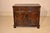Period Jacobean oak buffet with exquisite geometric paneled detail. The top is nicely grained and has banded ends and a...