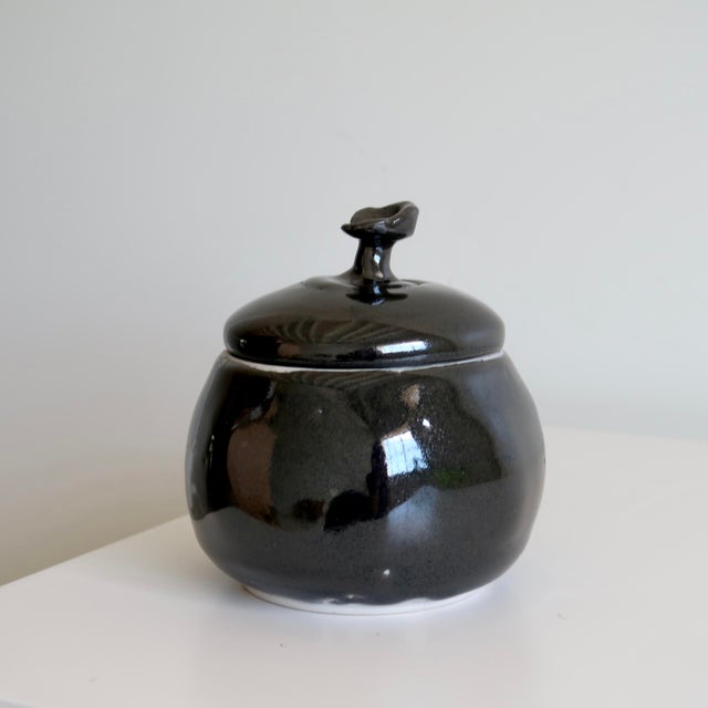 Onyx Signed Studio Pottery Lidded Ceramic Round Jar With Abstract Floral Finial in Monochromatic Black Glaze For Sale - Image 8 of 16
