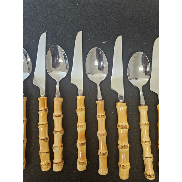 6 of each, fork, teaspoons, soup spoons and knives. Real bamboo handles with stainless. Great condition.