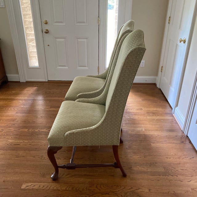 Pair of mahogany Queen Anne chairs by Hickory Chair Furniture. Light green damask upholstery fabric.