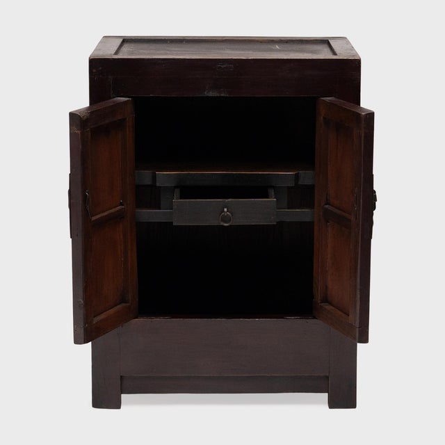 This small Chinese locking cabinet from the early 20th century has a richly aged patina that only time can achieve. The...