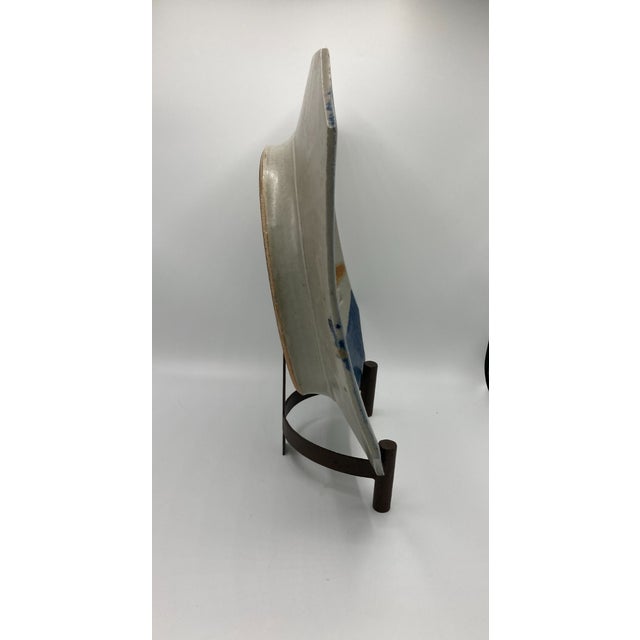 This is a vintage modern abstract studio pottery platter by Eric Norstad. The square or octagon platter is slightly...