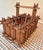 This object is a vintage piece of "Crown of Thorns" Tramp Art, handcrafted into the shape of a handled basket. It measures...