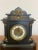 Quality antique Victorian marble mantle clock having black Roman numerals on a cream chapter ring, with a pavilion shaped...