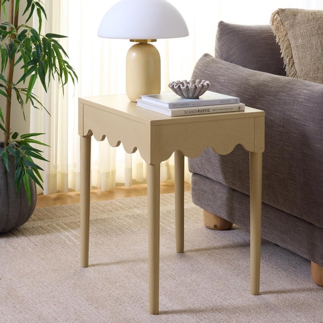 Add sophistication and warmth to any room with the Neha Accent Table. Crafted in a rich, natural finish, this elegant...