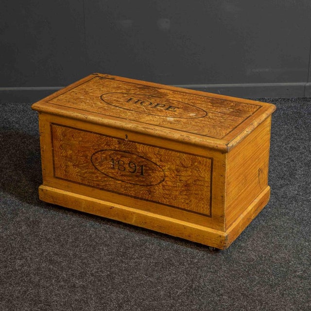 A super Victorian pine box it is original scrumbled pine finish. It sits on later castors and moves freely. The...