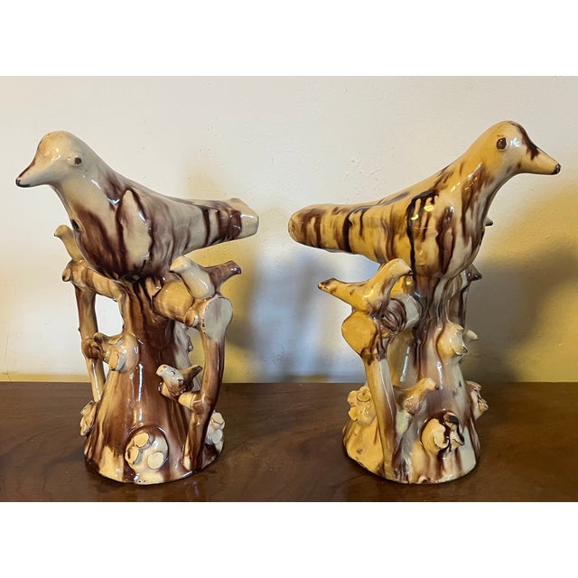 Pair large Staffordshire or Halifax slipware treacle glaze bird whistles. Wonderful folk art quality. You can make a...