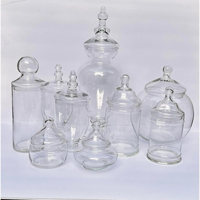 16.6" tall glass apothecary jar with fully detachable lid. Clear glass. Design decor for see-through storage or...