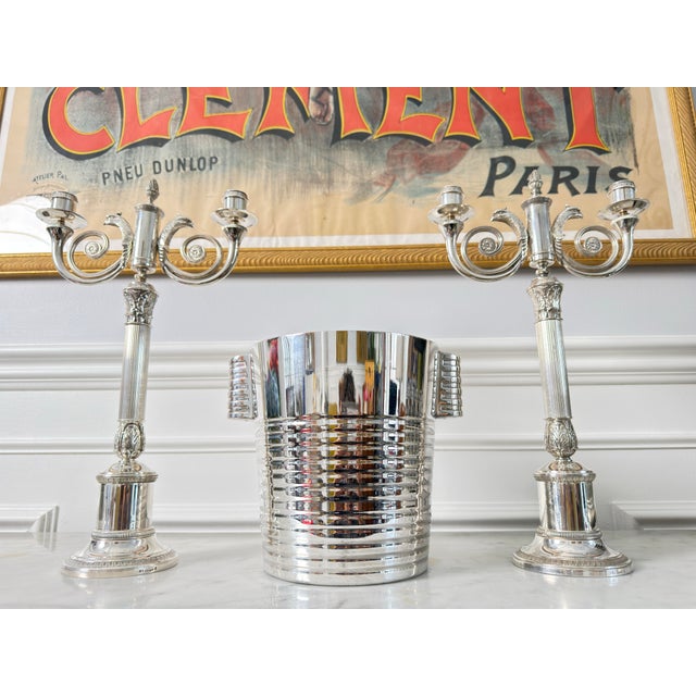 Introducing the icon "Ondulations" champagne buckets, designed by Luc Lanel for Christofle in 1933. This masterpiece...