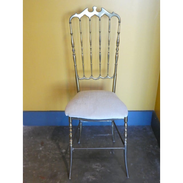 Elegant Italian 1960's Chiavari Flared Leg Exaggerated Back Brass Side Chair sold as found showing normal signs of...