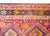 A bold and brilliant early 20th century Turkish Kars rug with several central diamond medallion running the length, and...