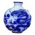 Early 20th Century Chinese White Peking Glass Blue Overlay Carved Dragon Snuff Bottle For Sale