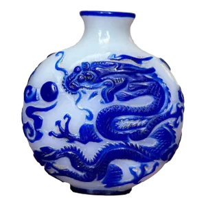 Early 20th Century Chinese White Peking Glass Blue Overlay Carved Dragon Snuff Bottle