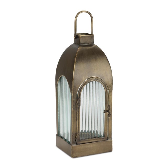 Add timeless elegance to your space with this Arched Iron and Ribbed Glass Lantern. Crafted with a sturdy iron frame and...