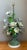 This exquisite vintage table lamp features a lush, hand-painted tole bouquet that captures the timeless elegance of mid-...