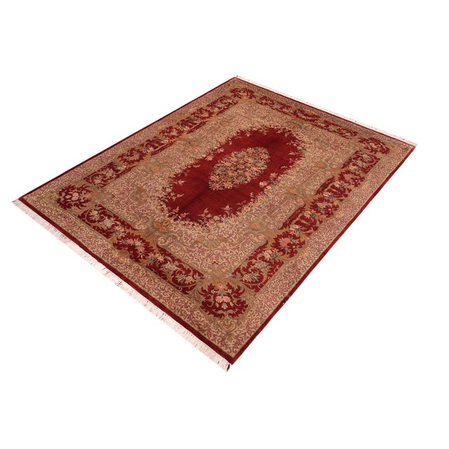 Designed with mesmerizing intricacy and gorgeous color palette, this hand-knotted masterpiece demonstrates the beauty and...