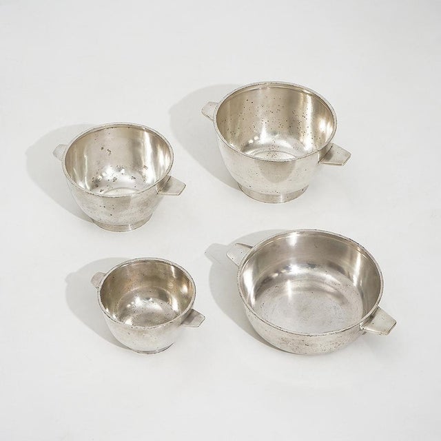 A refined set of four bowls designed by Gio Ponti for Fratelli Calderoni in the 1950s, an elegant example of the balance...